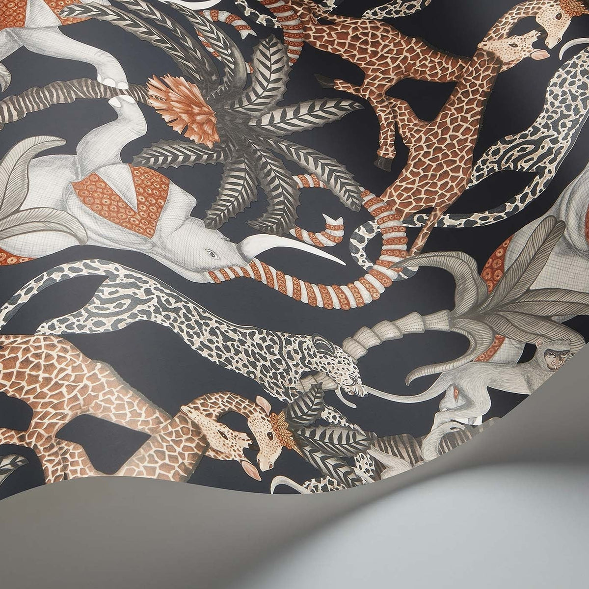 Safari Totem wallpaper by Cole & Son in Ginger & Taupe on Charcoal, curved paper detail