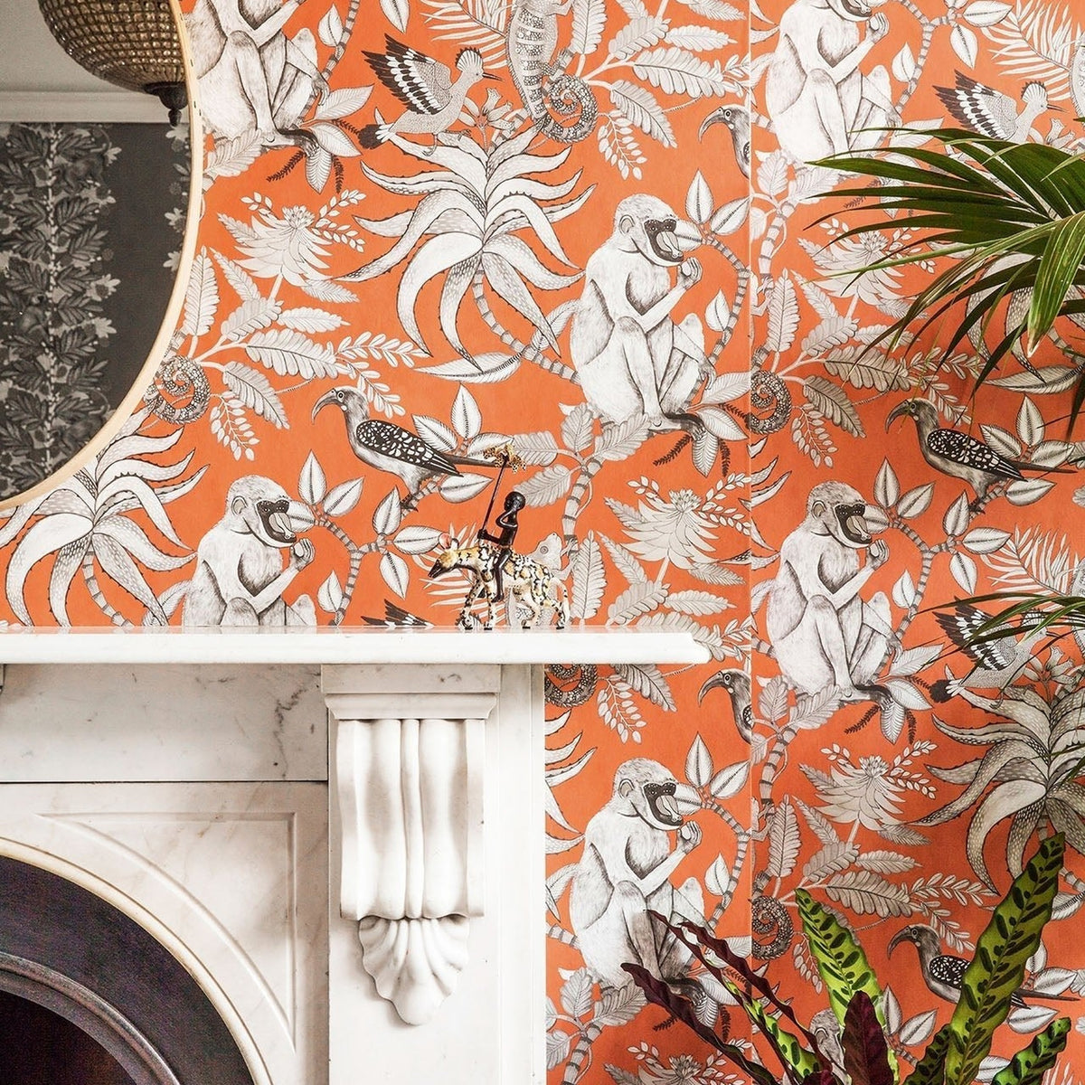 Savuti wallpaper by Cole & Son in Soot on Tangerine, room setting