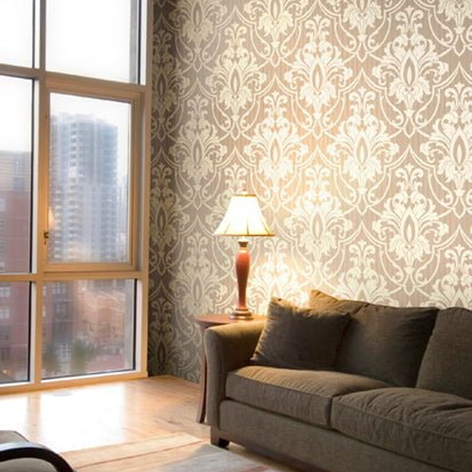 St Petersburg Damask wallpaper by Cole & Son in Metallic Gilver on Taupe, room setting