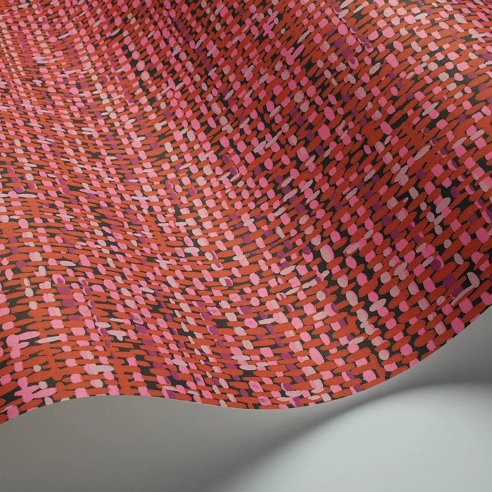 Tweed wallpaper by Cole & Son in Fuchsia & Rouge on Charcoal, curved wallpaper detail