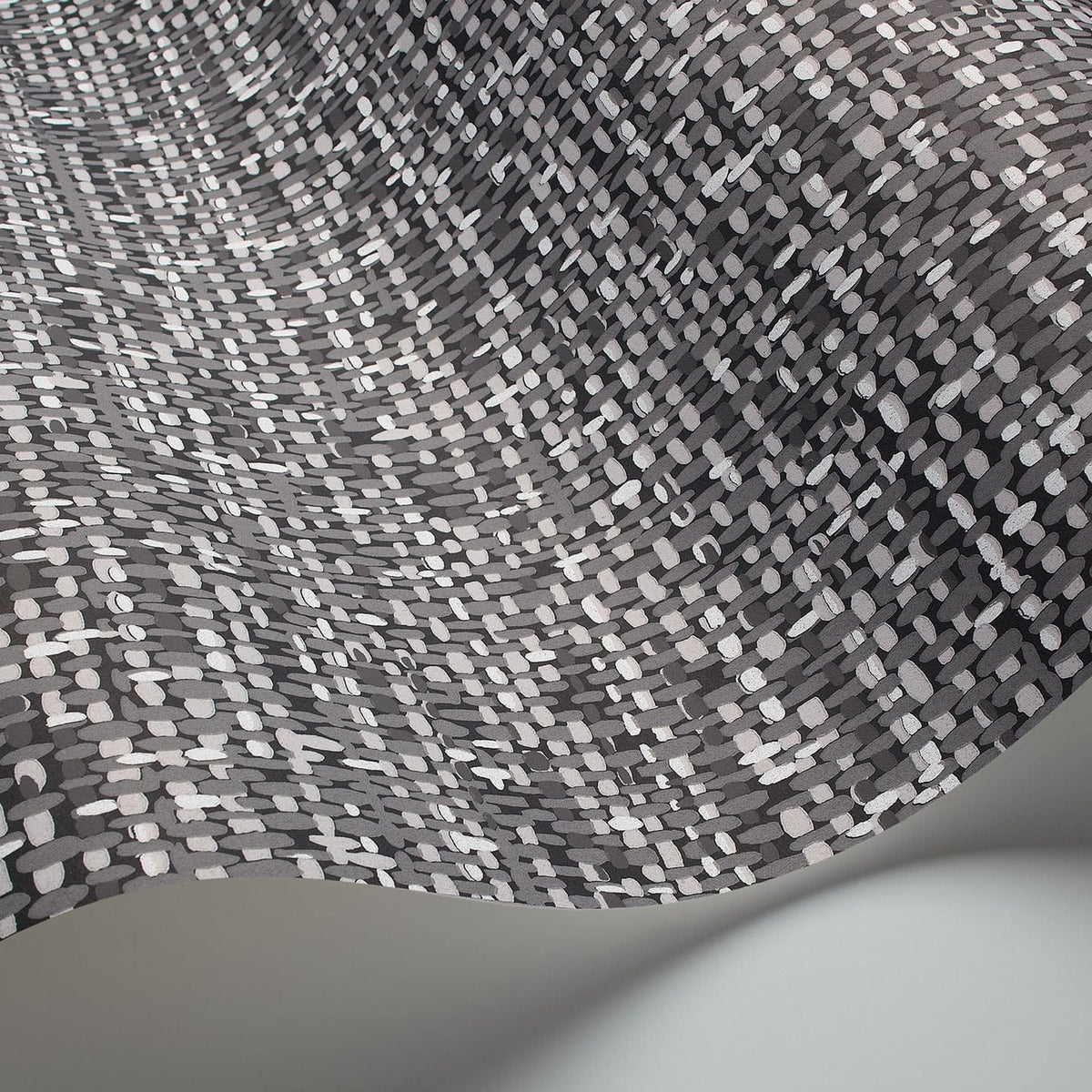 Tweed wallpaper by Cole & Son in Charcoal & Grey on Black, curved wallpaper detail