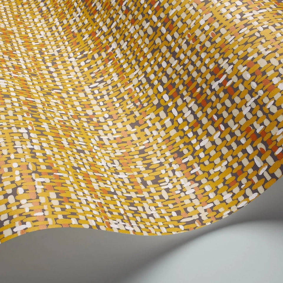 Tweed wallpaper by Cole & Son in Chartreuse & Burnt Orange on Soot, curved wallpaper detail