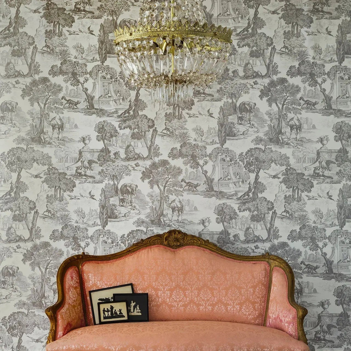 Versailles wallpaper by Cole & Son in Soot and Snow in a styled interior