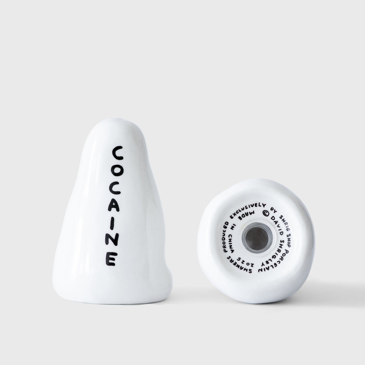 David Shrigley porcelain salt and pepper shakers, showing underside and openings