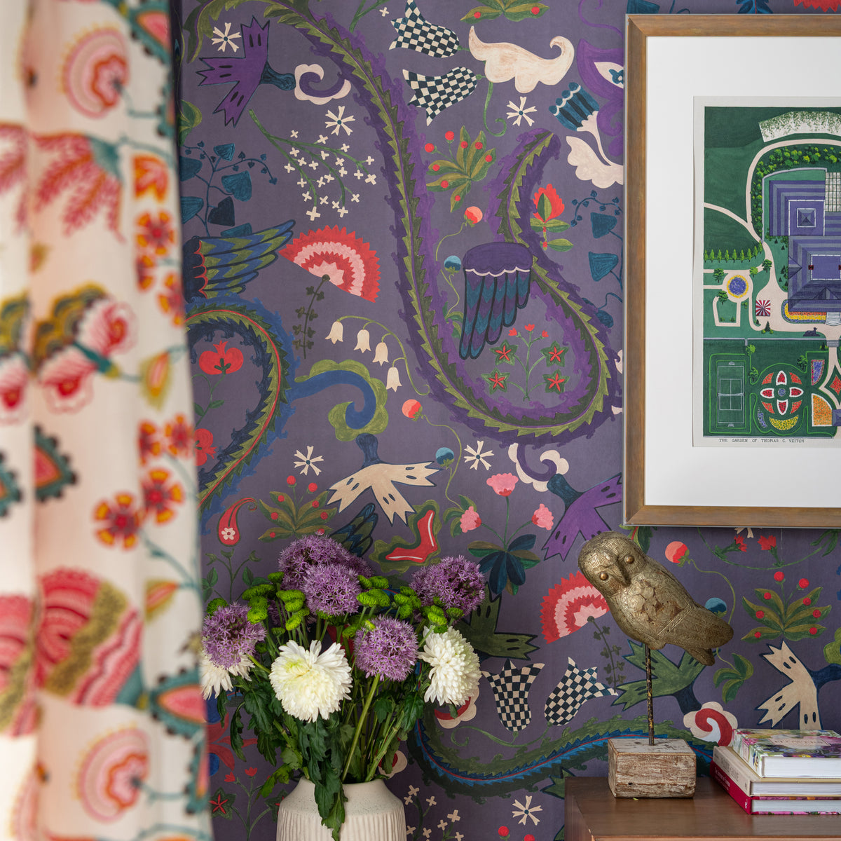 Dragon Flower Purple wallpaper by MINDTHEGAP, close-up in a styled interior.