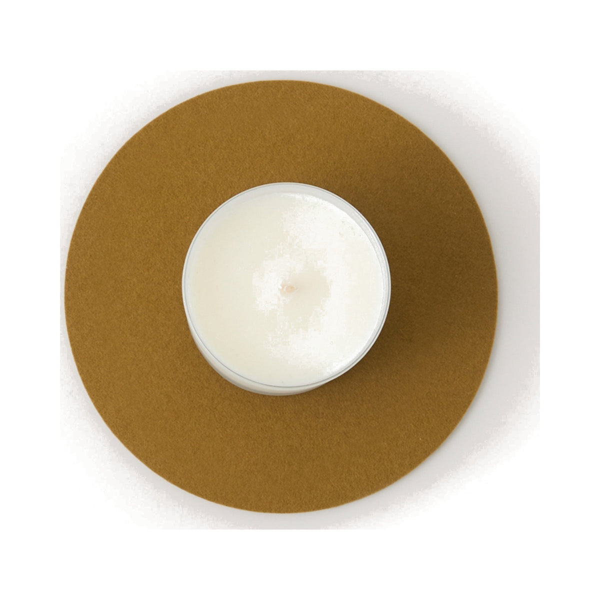 Graf Lantz Brine 8-inch round Merino wool felt trivet with a candle, viewed from above