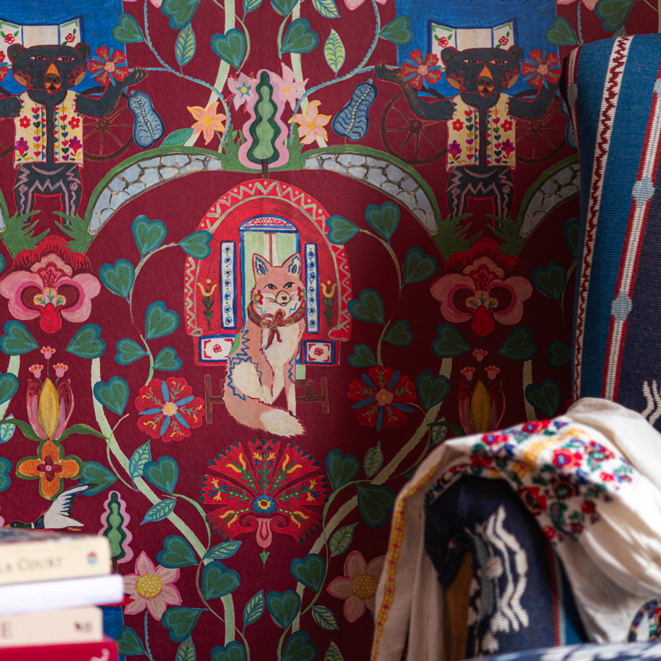 Gypsy Fairytale Ruby wallpaper by MINDTHEGAP, close-up in a styled interior.