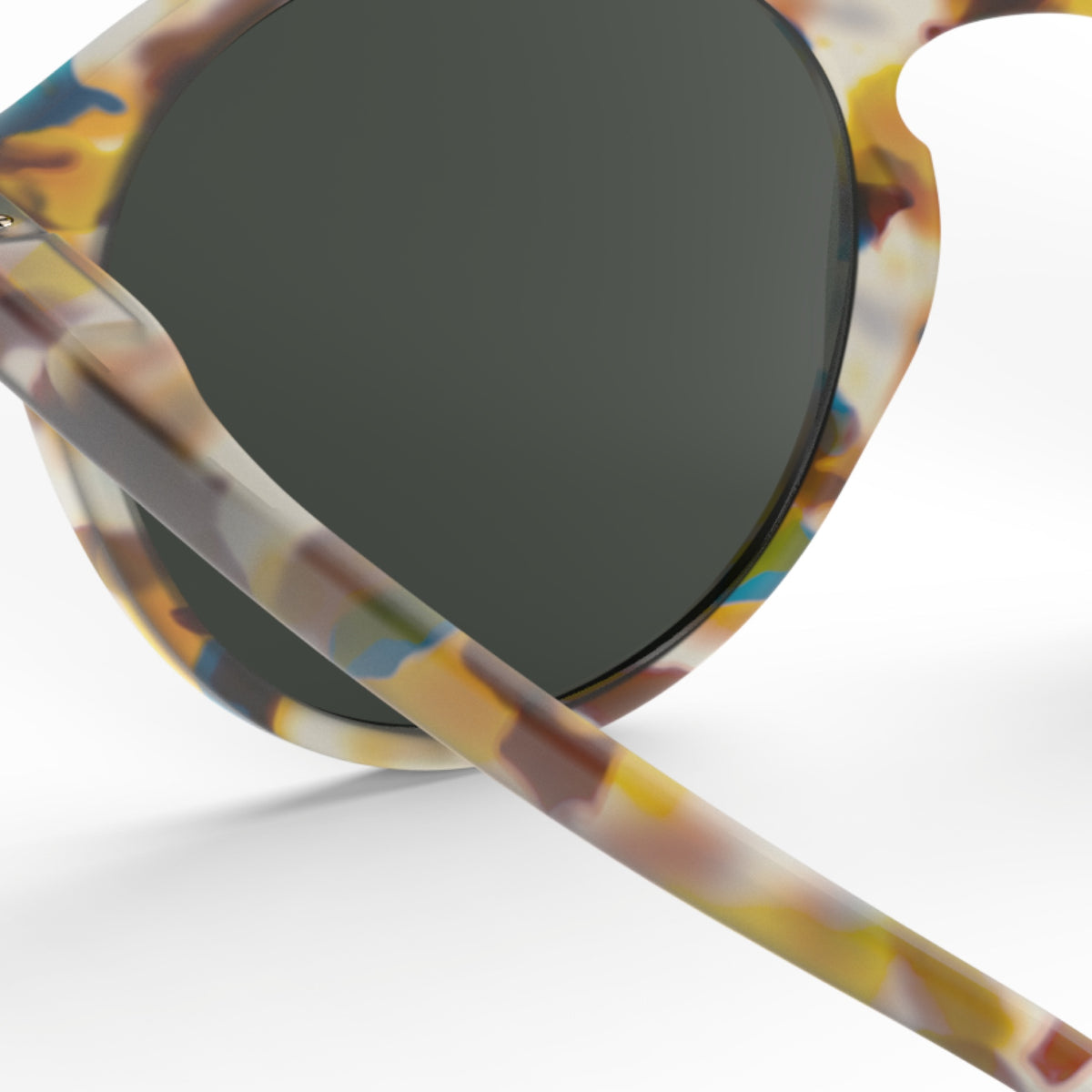 Frame and lens detail of IZIPIZI #D Sunglass Readers in Blue Tortoise