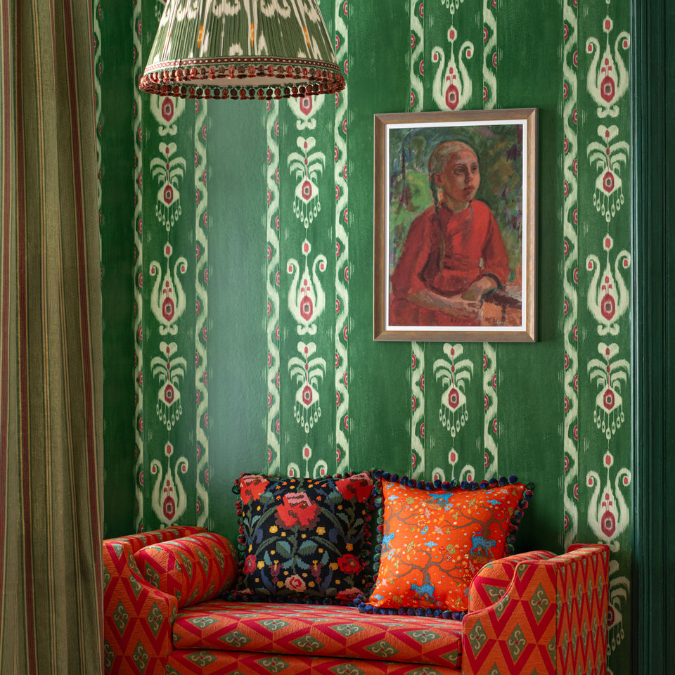 Kiraly Emerald wallpaper by MINDTHEGAP, shown in a furnished interior.