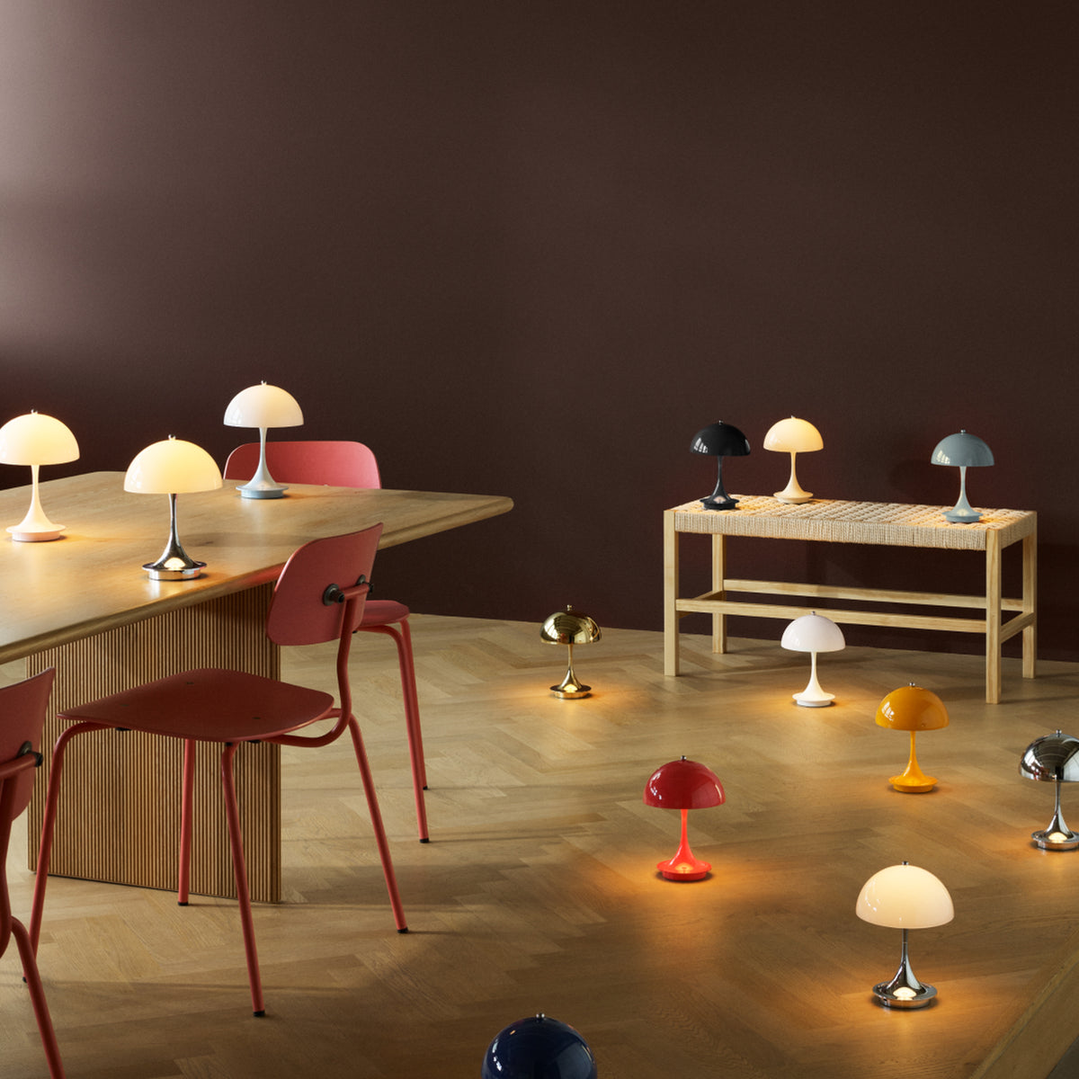 Louis Poulsen Panthella portable lamps displayed together in a range of colors.