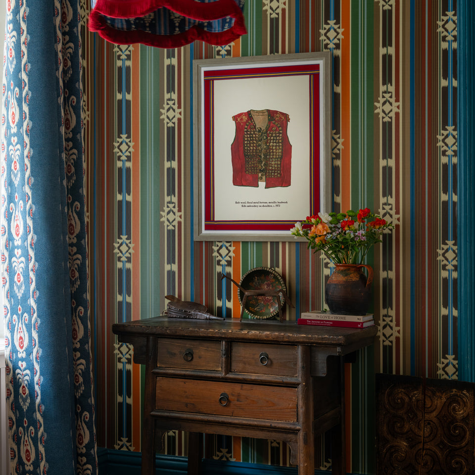 Mistletoe Poly wallpaper by MINDTHEGAP, shown in a furnished interior.