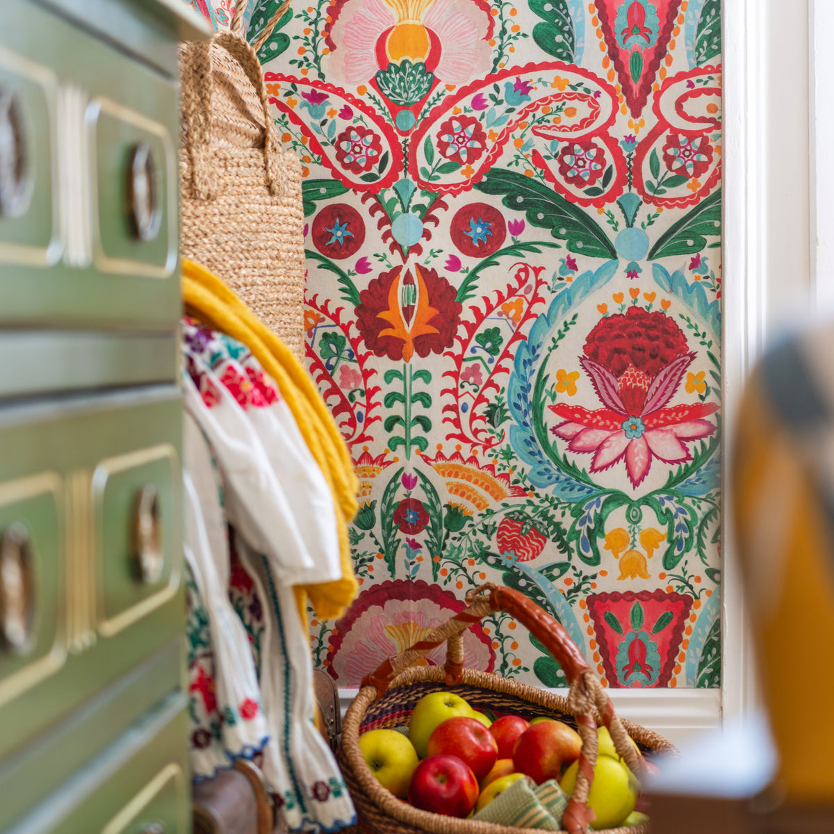 Rosa Mundi wallpaper by MINDTHEGAP, close-up in a styled interior.