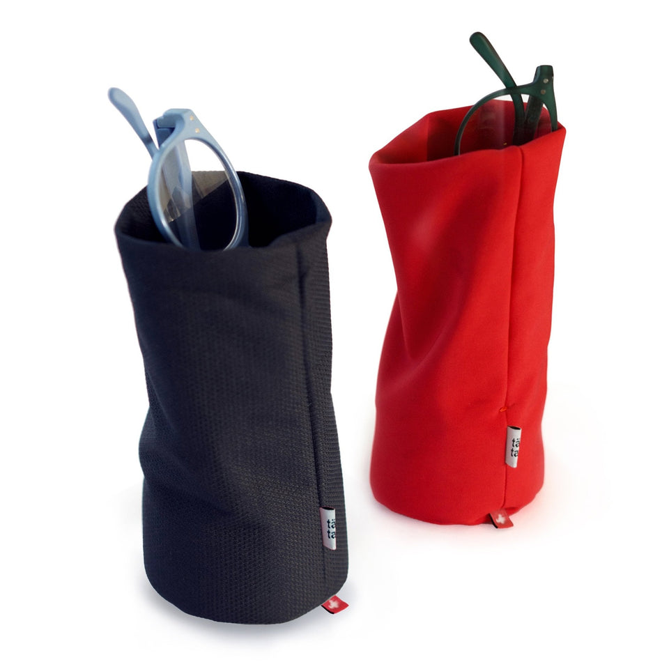 Night Blue and Red Tat-Tat Sacco storage pouches holding eyeglasses