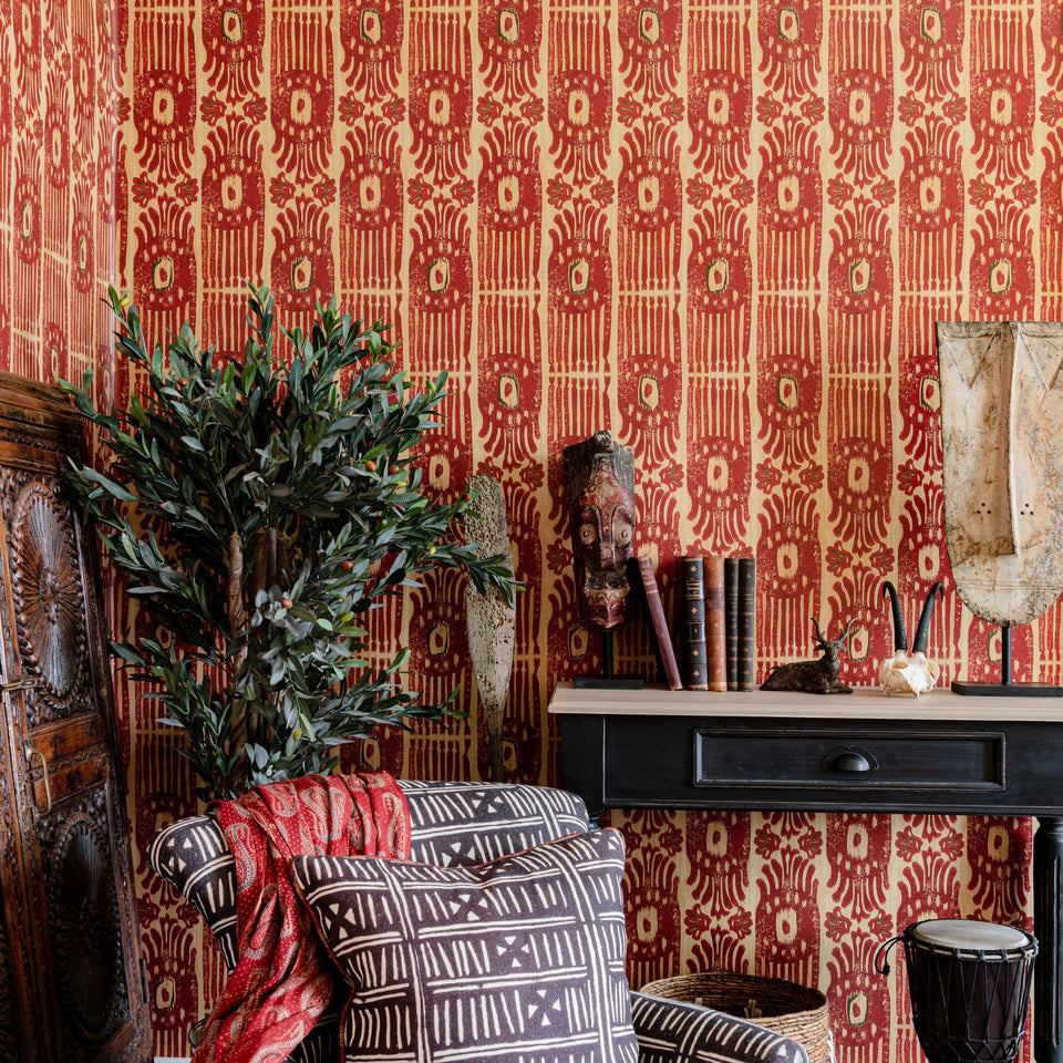 Tribal Ikat Lava Red wallpaper by MINDTHEGAP — room setting showing Lava Red colorway
