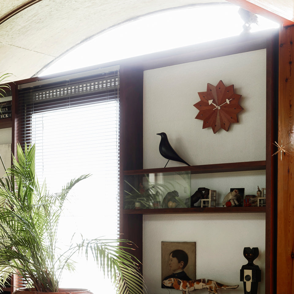 George Nelson Fan Clock on the wall of a living room
