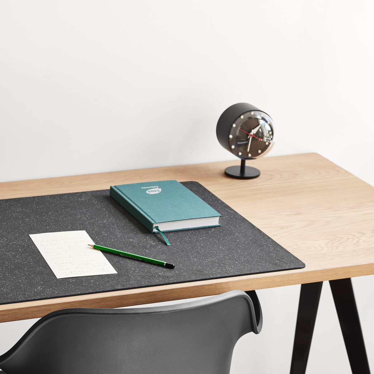 George Nelson Night Desk Clock on a desk with Repad and Toolbox