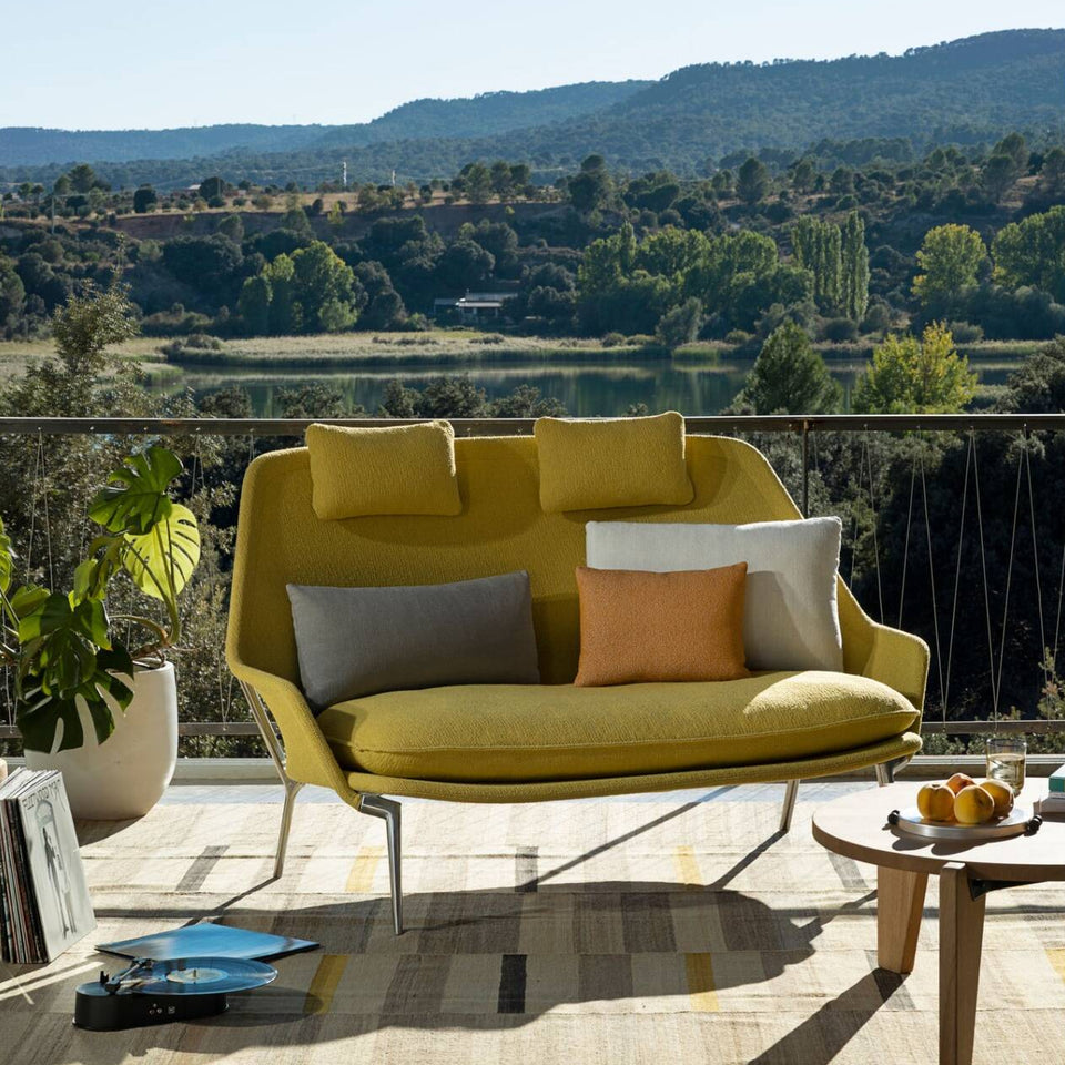 Vitra Slow Sofa in canola upholstery in a lakeside interior