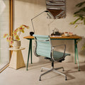 Cream Tabouret Métallique used as a plant stand beside a home office desk