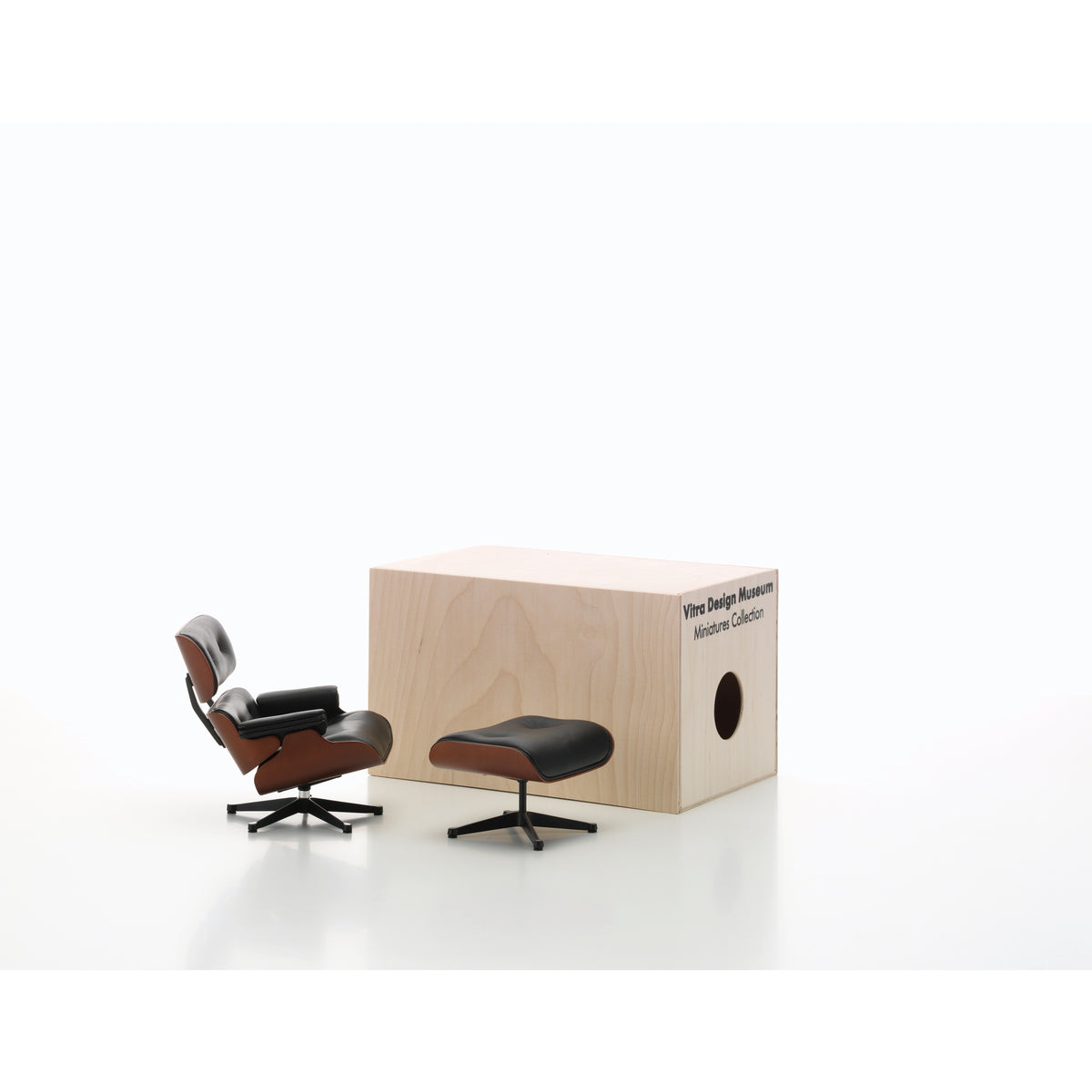 Miniature Lounge Chair + Ottoman by Eames for Vitra, 1:6-scale collectible model shown with its presentation box