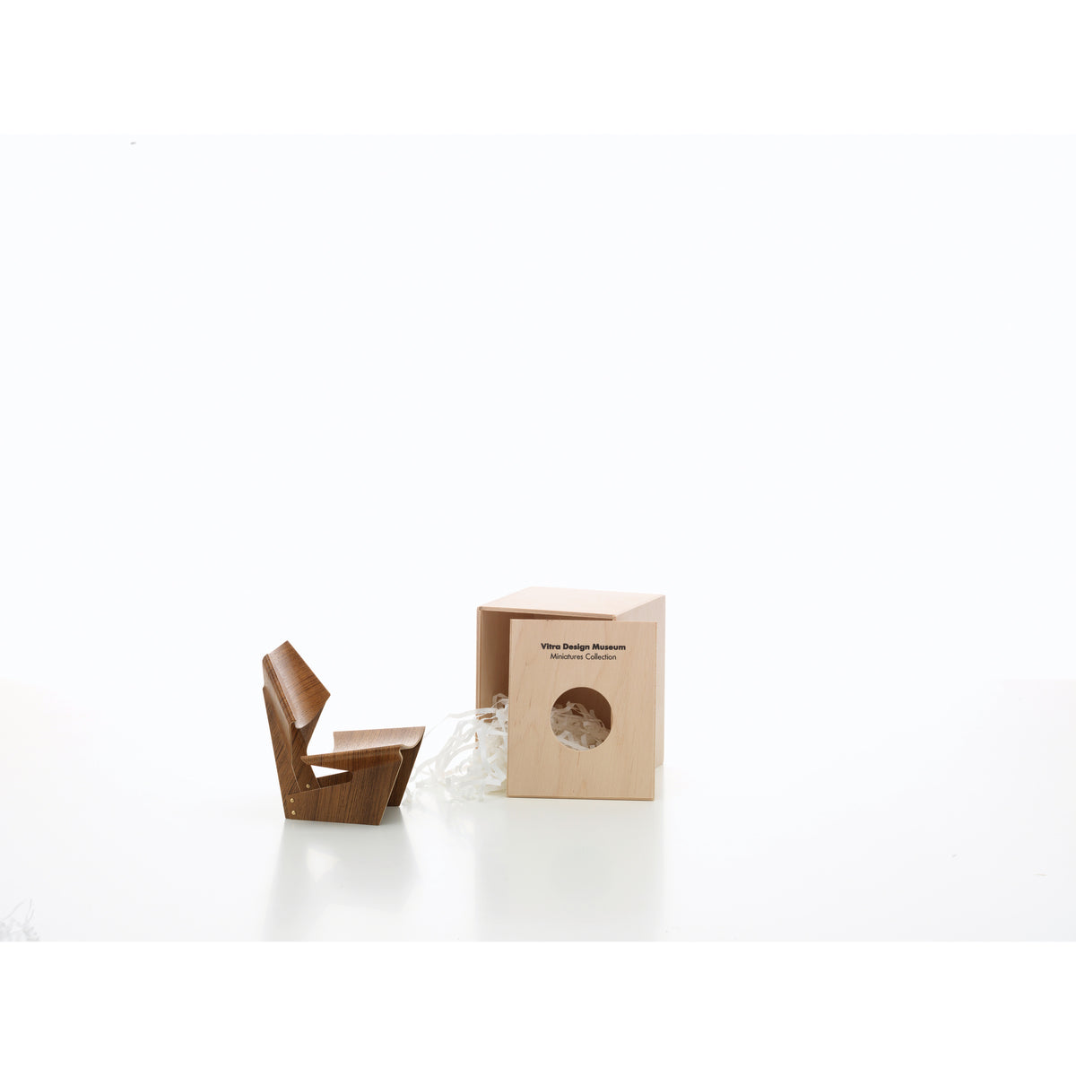 Miniature GJ Plywood Chair by Jalk for Vitra, 1:6-scale collectible model shown with its presentation box