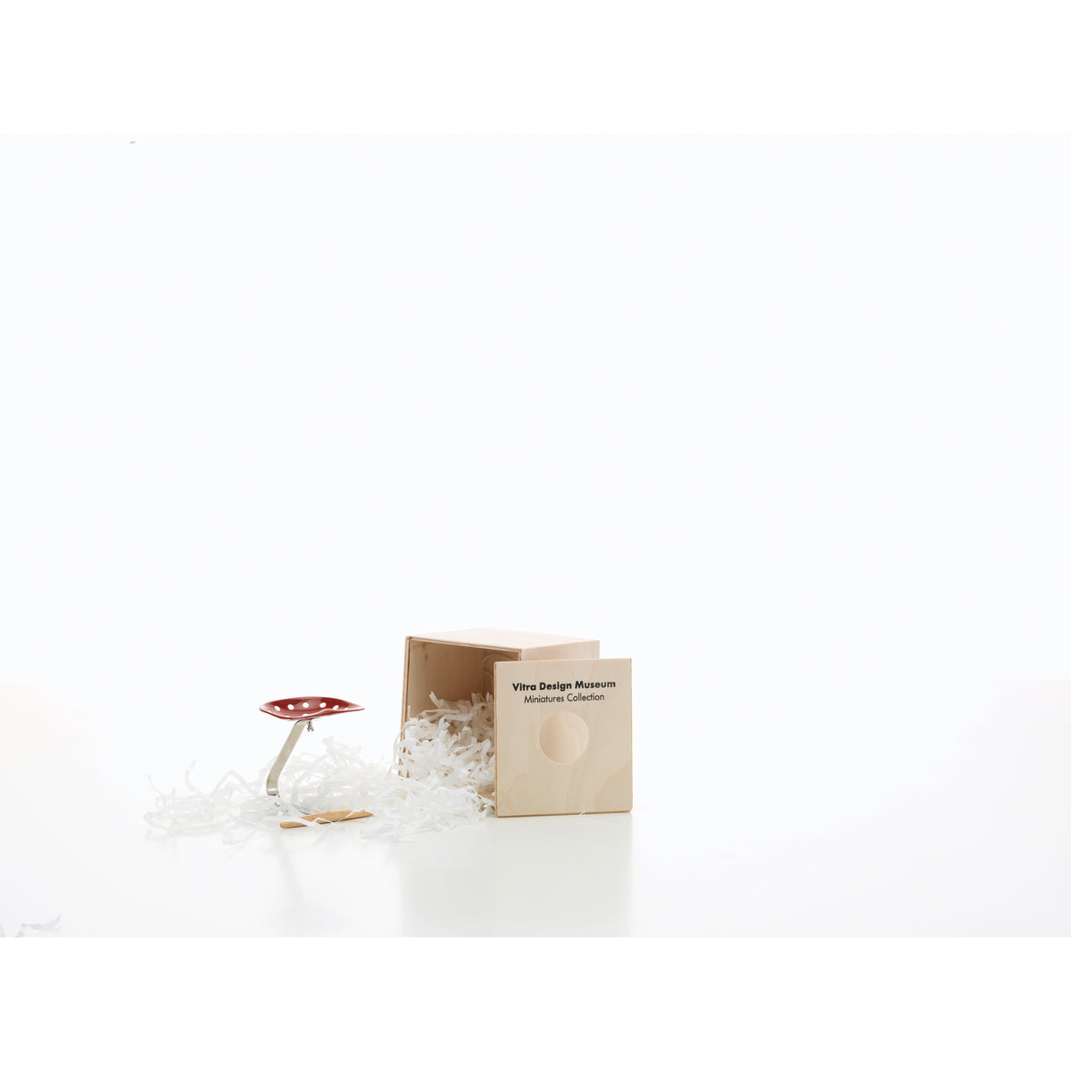 Miniature Mezzadro Chair by Castiglioni for Vitra, 1:6-scale collectible model shown with its presentation box