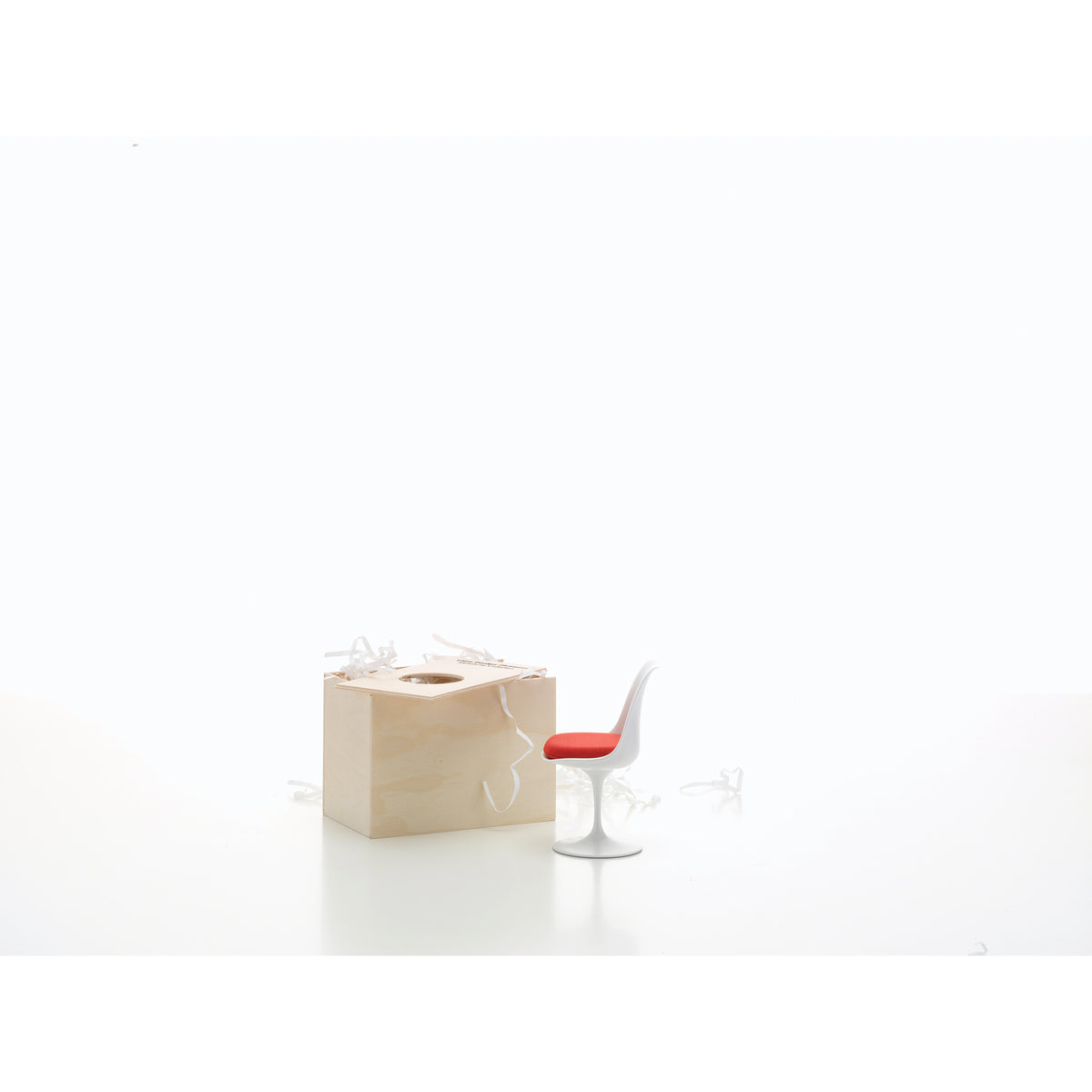 Miniature Saarinen Tulip Chair by Saarinen for Vitra, 1:6-scale collectible model shown with its presentation box