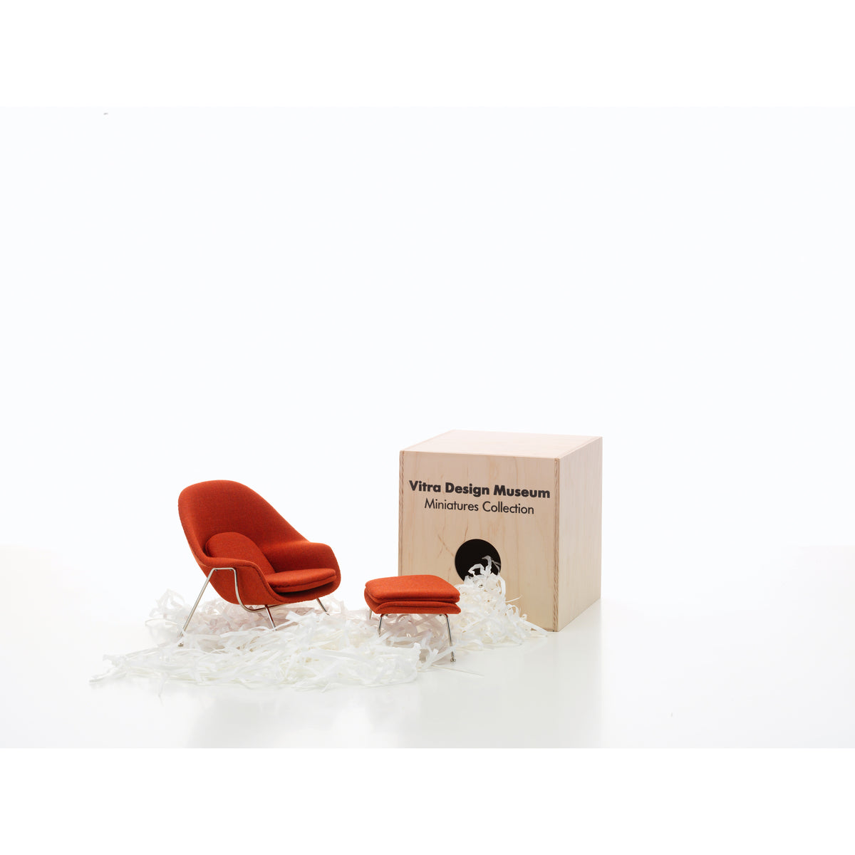 Miniature Womb Chair + Ottoman by Saarinen for Vitra, 1:6-scale collectible model shown with its presentation box