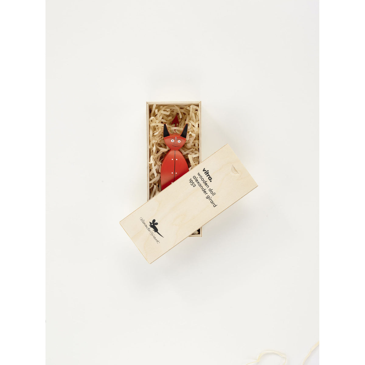 Vitra Wooden Doll Little Devil by Alexander Girard shown in its wooden presentation box