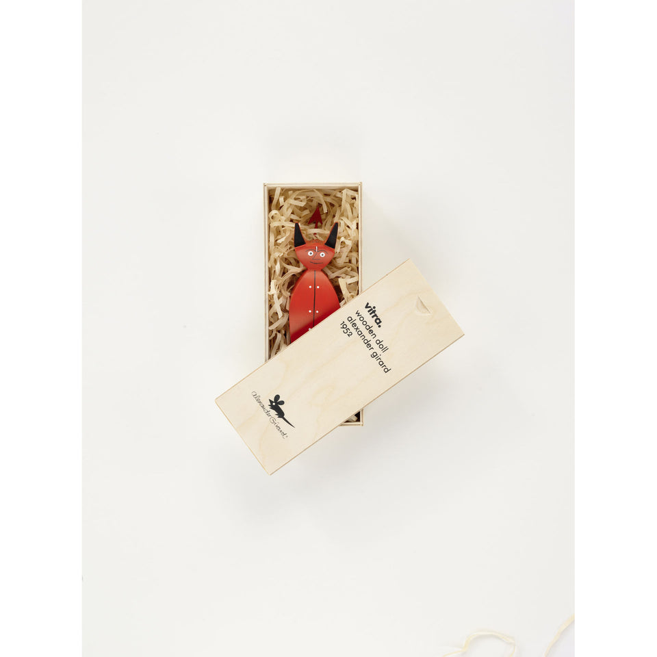 Vitra Wooden Doll Little Devil by Alexander Girard shown in its wooden presentation box